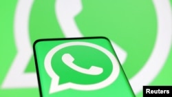 FILE: The Whatsapp logo is seen in this illustration on a smartphone. Taken Aug. 22, 2022. 