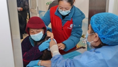 As China Races to Vaccinate Older People, Many Remain Unwilling