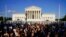 FILE - Protesters fill the street in front of the Supreme Court after the court's decision to overturn Roe v. Wade in Washington, June 24, 2022.