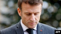 FILE: France's President Emmanuel Macron at the Elysee presidential palace in Paris on January 3, 2023. Macron has been hit by massive riots in multiple cities over the police killing of a teen in suburban Paris. 