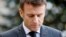 FILE - France's President Emmanuel Macron looks on upon the arrival of Sweden's Prime Minister for a working lunch at the Elysee presidential palace in Paris on Janu. 3, 2023.
