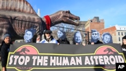 Actor and activist James Cromwell, third left, called on world leaders to act in the talks at COP15 in Montreal, Quebec, Canada, Dec. 15, 2022, in this image distributed by Avaaz.