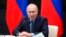 Russian President Vladimir Putin speaks during a meeting with leadership of military-industrial complex enterprises in Tula, Russia, Dec. 23, 2022. 