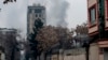 Smoke rises from a site of an attack at Shar-e Naw which is city's one of main commercial areas in Kabul, Dec. 12, 2022.