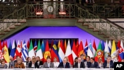 Polish Minister of Foreign Affairs Zbigniew Rau, center, delivers a closing speech during a high-level meeting of the Organization for Security and Cooperation in Europe in Lodz, Poland, Dec. 2, 2022. 