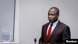 Dominic Ongwen, a former Ugandan child soldier who became a commander of the rebel Lord's Resistance Army, appears before the International Criminal Court in The Hague, Netherlands, Dec. 15, 2022. 