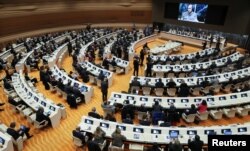 Pakistan's Prime Minister Shehbaz Sharif addresses a summit on climate resilience in Pakistan, at the United Nations, in Geneva, Switzerland, Jan. 9, 2023.