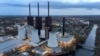 FILE - A cooling tower of the Lichterfelde gas-fired power plant is seen in Berlin, Germany, March 30, 2022. 