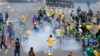 Protesters, supporters of former President Jair Bolsonaro, clash with police during a protest outside the Planalto Palace building in Brasilia, Brazil, Jan. 8, 2023. 