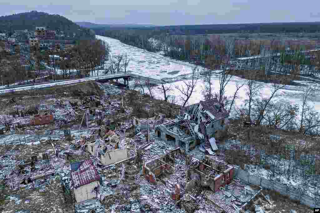 Houses destroyed by Russian forces are seen from above, near the the blowed-up bridge across Siverskiy-Donets river in the recently liberated village of Bogorodychne, Ukraine.