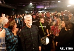 Presidential candidate and former Chairman of the NATO Military Committee and Czech Army General Petr Pavel arrives at a rock club in Prague, Czech Republic, Jan. 9, 2023.