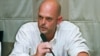 FILE - Nate Thayer, the American journalist who interviewed Pol Pot, speaks at the Foreign Correspondents' Club in Bangkok, Thailand, July 16, 1997. 