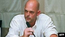 FILE - Nate Thayer, the American journalist who interviewed Pol Pot, speaks at the Foreign Correspondents' Club in Bangkok, Thailand, July 16, 1997. 