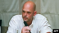 FILE - Nate Thayer, the American journalist who interviewed Pol Pot, speaks at the Foreign Correspondents' Club in Bangkok, July 16, 1997. 