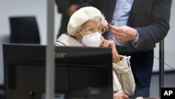 Irmgard Furchner, accused of being part of the apparatus that helped the Nazis' Stutthof concentration camp function, appears in court for the verdict in her trial in Itzehoe, Germany, Dec. 20, 2022. 