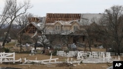 A home after a possible tornado swept through, Dec. 13, 2022, near Decatur, Texas.