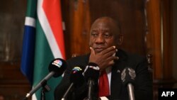 FILE - South Africa's President Cyril Ramaphosa speaks during a press conference in central London, Nov. 24, 2022.