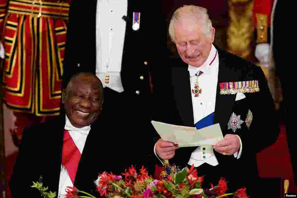 President Cyril Ramaphosa of South Africa, laughs as King Charles III speaks during the State Banquet held at Buckingham Palace, London, during the State Visit to the UK by the South African president. Picture date: Tuesday November 22, 2022.