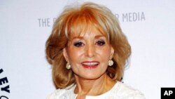 FILE - Barbara Walters arrives to participate in a panel discussion featuring the hosts of ABC's 'The View,' at The Paley Center for Media on April 9, 2008, in New York. 