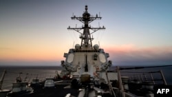 The guided-missile destroyer USS Chung-Hoon transits the Pacific Ocean in 2020. (AFP PHOTO / US Navy / Mass Communication Specialist 1st Class Devin M. Langer)