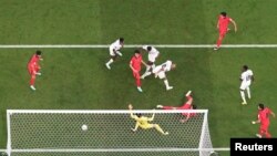 Ghana's Mohammed Salisu scores the opening goal against South Korea at the 2022 FIFA World Cup, Qatar, November 28, 2022