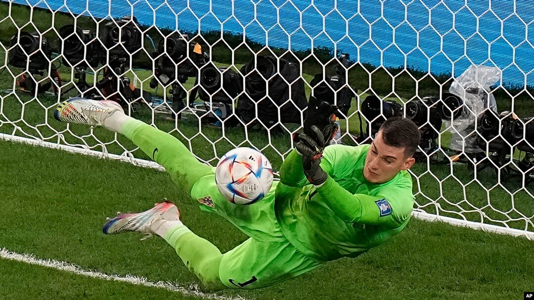 Dominik Livakovic stands tall as Croatia oust favourites Brazil on  penalties to reach semifinals