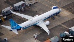 FILE — A Boeing 737 MAX 10 airplane sits at King County International Airport-Boeing Field in Seattle, Washington, June 1, 2022. Boeing is set to deliver a 737 MAX to a Chinese airline on Wednesday, flight data shows.