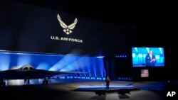FILE - Secretary of Defense Lloyd Austin introduces the B-21 Raider stealth at Northrop Grumman, Dec. 2, 2022, in Palmdale, Calif. 