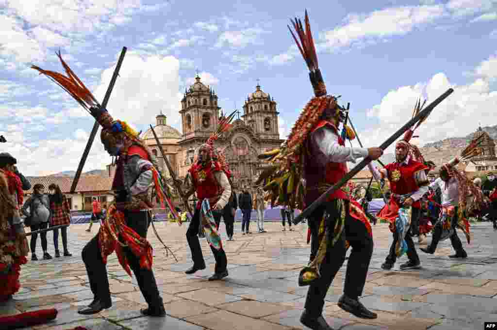 Artists and dancers perform during the Qhapac Raymi (summer solstice) Festival in the Andean city of Cusco, Peru, Dec. 21, 2022.