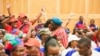 Delegates cheer at the 7th Swapo Party Congress as intra-party election results were being announced, in Windhoek, Namibia, Nov. 29, 2022. (Vitalio Angula/VOA)