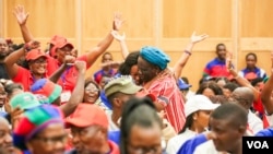 Delegates cheer at the 7th Swapo Party Congress as intra-party election results were being announced, in Windhoek, Namibia, Nov. 29, 2022. (Vitalio Angula/VOA)