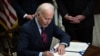 Biden Signs Bill Averting Strike, to Rail Unions' Dismay 