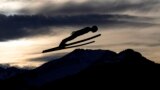 Anze Lanisek of Slovenia soars through the air during the first stage of the 71th Four Hills ski jumping tournament in Oberstdorf, Germany, Dec. 28, 2022.