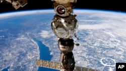 圖為與國際太空站對接的俄羅斯聯盟飛船。
