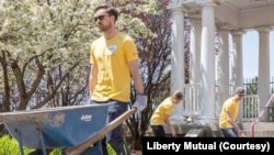 Liberty Mutual employees clean up the outside of a shelter for women and families in Boston. (Photo courtesy of Liberty Mutual)