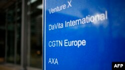FILE - CGTN Europe is listed on a sign outside the offices of China Global Television Network, in Chiswick Park, London, Feb. 4, 2021.