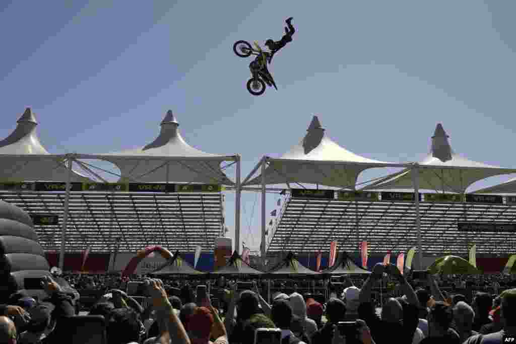 Monster Energy Freestyle Motocross Chilean biker Marco Chino Gonzalez performs at the Fan Zone of the Argentina Grand Prix, in Termas de Rio Hondo, in the Argentine northern province of Santiago del Estero, April 1, 2022.