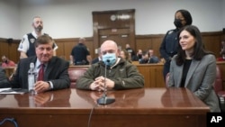 Former Trump Organization chief financial officer Allen Weisselberg, center, appears during his sentencing hearing in Manhattan Supreme Court, Jan. 10, 2023, in New York. 