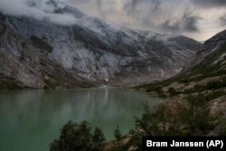 The Nigardsbreen glacier in Jostedal, Norway on August 5, 2022. The glacier has lost almost three kilometers in length in the past century due to climate change. (AP Photo/Bram Janssen)