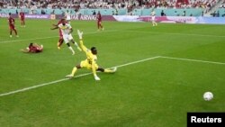 Senegal's Boulate Dia scores the opening goal against Qatar in a Group A fixture at the 2022 FIFA World Cup