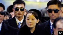 FILE - In this Feb. 9, 2018, file photo, North Korean leader Kim Jong Un's younger sister Kim Yo Jong, center, arrives at the Jinbu train station in Pyeongchang, South Korea. (AP Photo/Lee Jin-man, File)