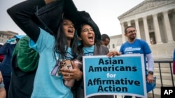 FILE - Students rally as the Supreme Court hears arguments on cases about affirmative action in admissions, in Washington, Oct. 31, 2022.