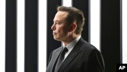 FILE - Elon Musk, Tesla CEO, attends the opening of the Tesla factory Berlin Brandenburg in Gruenheide, Germany, March 22, 2022. 