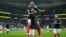 Franse Olivier Giroud selebre ak Kylian Mbappe apre li make yon gol nan ouveti match seleksyon nasyonal La Frans kont La Poloy, nan Mondyal Foutbol Qatar la, Dimanch 4 Desanm, 2022. 