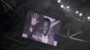 A photograph of Brazilian football legend Pele is displayed on a giant screen prior to a football match at the Velodrome stadium in Marseille, Dec. 29, 2022. 