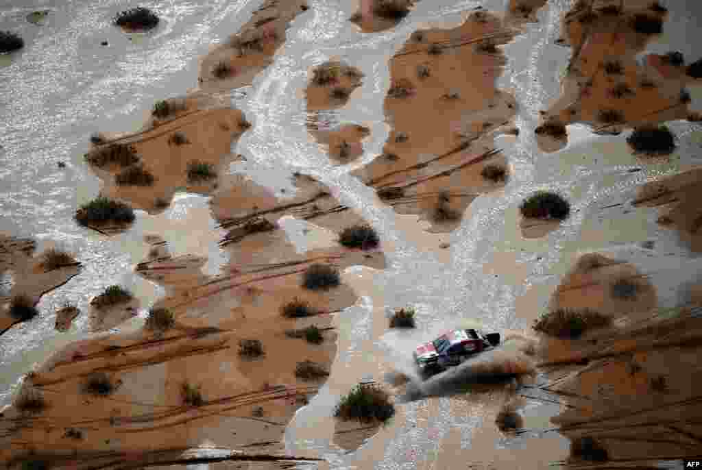 Toyota&#39;s driver Giniel De Villiers and co-driver Dennis Murphy of South Africa compete during Stage 9 of the Dakar 2023 rally between Riyadh and Haradh in Saudi Arabia.