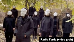 In this screenshot of a video published by VOA's sister network RFE/RL on Dec. 10, 2022, Tehran theater students perform a piece of protest art. (Radio Farda)