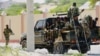 FILE - Somali military soldiers in Mogadishu, April 27, 2022. Two suicide car bombers killed at least 15 people in the town of Mahas in central Hiran region.