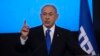 FILE - Benjamin Netanyahu, berbicara kepada para pendukungnya setelah hasil exit poll pertama untuk pemilihan Parlemen Israel di markas partainya di Yerusalem, 2 November 2022. (AP/Oren Ziv, File)