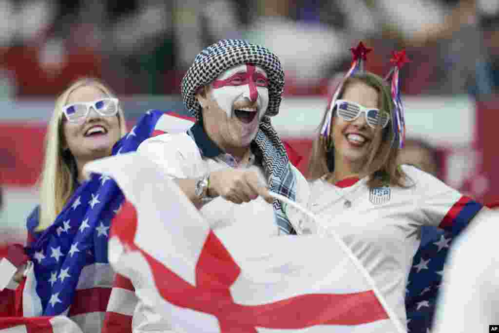 US and England supporters cheer their teams prior to the start of the World Cup group B soccer match between England and The United States, at the Al Bayt Stadium in Al Khor , Qatar.